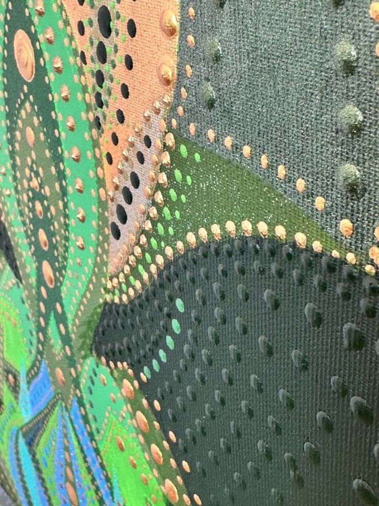 Green and gold surface detail of Dance of Green Tara