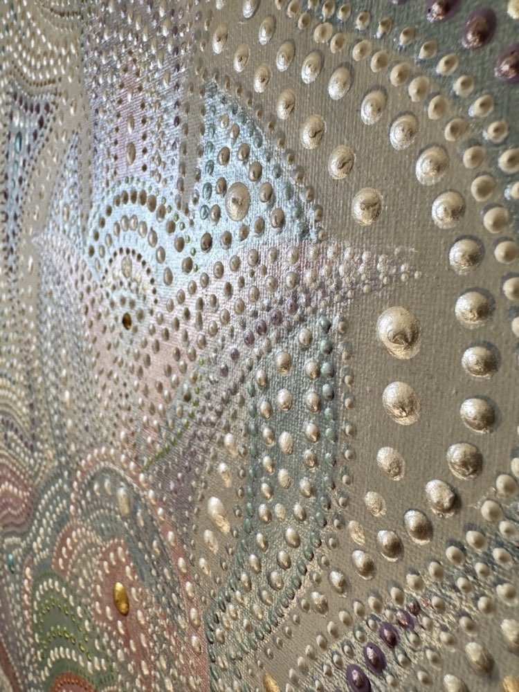 Pearlescent relief detail of Dance of White Tara