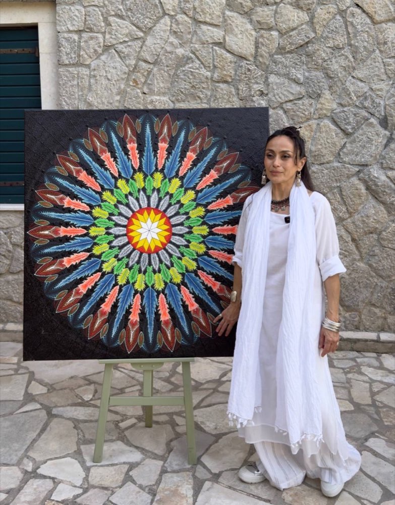 Mohsira with her artwork