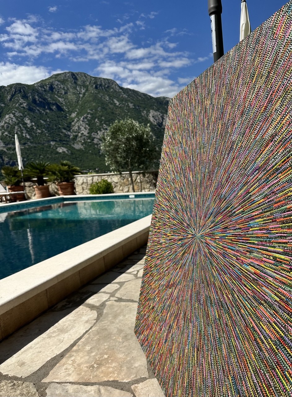 Spanda Hvala displayed outdoors by a pool